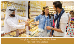 Traditional gold jewelry displayed in Dubai Gold Souk, featuring intricate necklaces, bracelets, and rings.