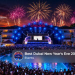 Crowds gathering in Dubai to celebrate New Year's Eve with dazzling fireworks and festive city lights.