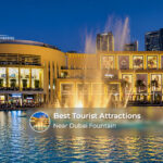Visitors exploring popular attractions around Dubai Fountain, with views of Downtown Dubai's skyline and waterfront promenades.